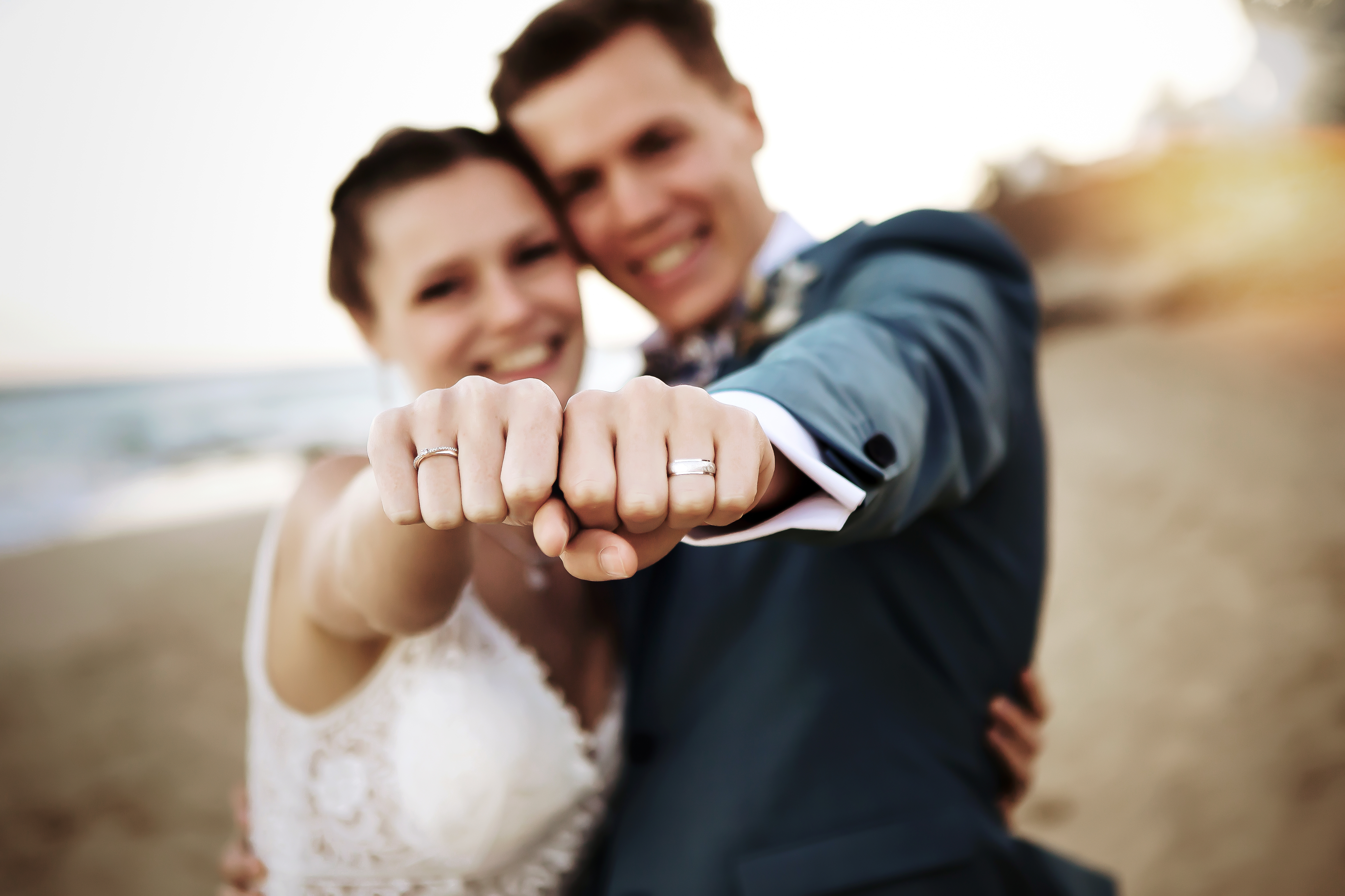 Bride and groom show rings to wedding photographer in Fuerteventura